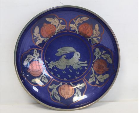 Jonathan Chiswell Jones East Sussex studio pottery plate with central panel of a running hare surrounded by smaller panels of