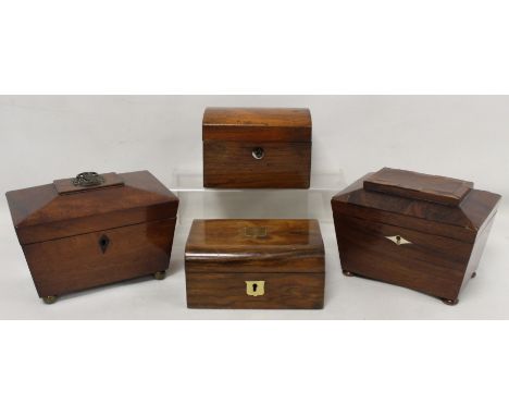 Two small Georgian mahogany tea caddies of sarcophagus form, the interiors with lidded compartments, 18cm wide and 19cm wide;
