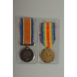 JAMES BRENNAN. MARCH R. PTE 202979. MANCHESTER REGT. DUO with ribbons.