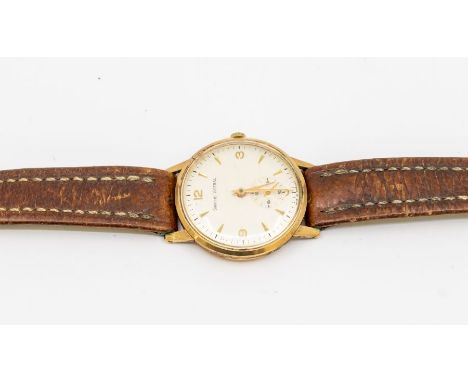 A gents Smiths Astral 9ct gold silvered dial with arrow and number markers, subsidiary at 6, case apprx 10mm, inscription to 