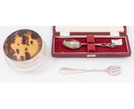 A Modern cased silver ornate teaspoon with scrolling engraved thistle head terminal, hallmarked by Francis Howard, Sheffield,