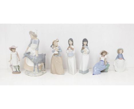 Seven Nao figures to include children, girl with goat plus others.