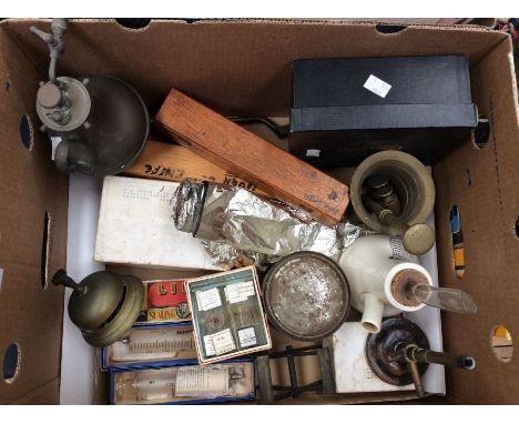 A collection of pharmaceutical and chemist items including microscope slides, instruments, Bunsen burner, cutting tools, bras