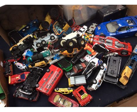Steiff bear, along with Matchbox and other toy cars