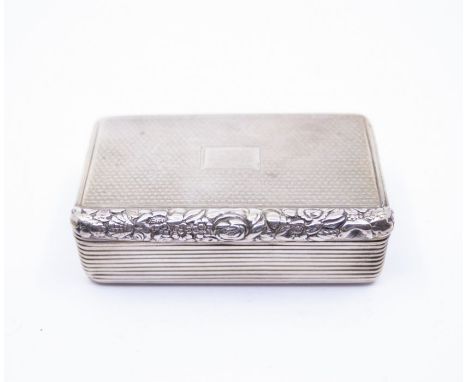 A George III silver snuff box, engraved cover and base with wiggle work, reeded sides and foliage thumbpiece, hallmarked by T