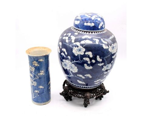 A late 19th Century blue and white ginger jar on stand, along with a brush pot Kangxi blossom detail