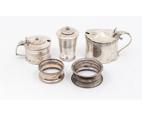 A collection of table silver to include: George VI engine turned mustard pot &amp; cover, blue glass liner with matching pepp