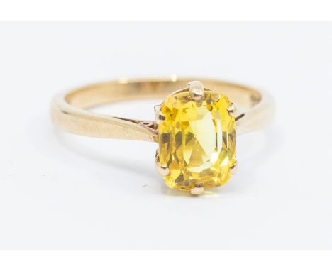 A yellow sapphire and 9ct gold ring, comprising a cushion shaped yellow sapphire claw set, weight approx 1.70ct, size L1/2, 2