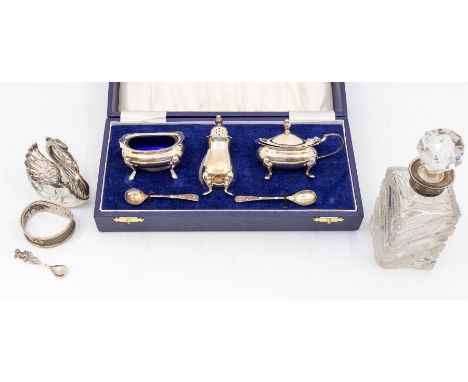 A collection of silver to include: Georgian style matched three piece condiment set with pair of spoons, hallmarked by Barker