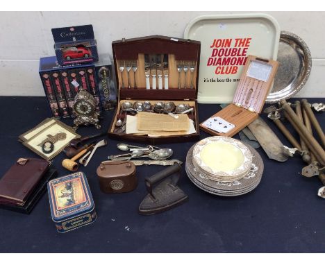 Mixed lot containing Double Diamond tray, vintage wallets, plated wares, mantle clock, metal wares, videos, fire irons, vinta