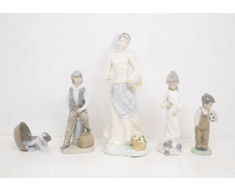 Four Nao figures of young children, along with large Nao style figure