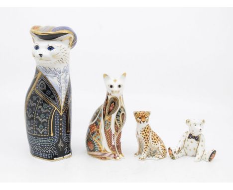 Four Royal Crown Derby paperweights including Pearly Queen Cat, Egyptian Cat, Cheetah Cub and Teddy Bear, all silver stoppers