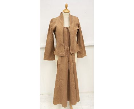 A Burberry raincoat in cream approx. size 14. A portion of the lining is tornA velvet jaeger jacket with a leopard skirt prin