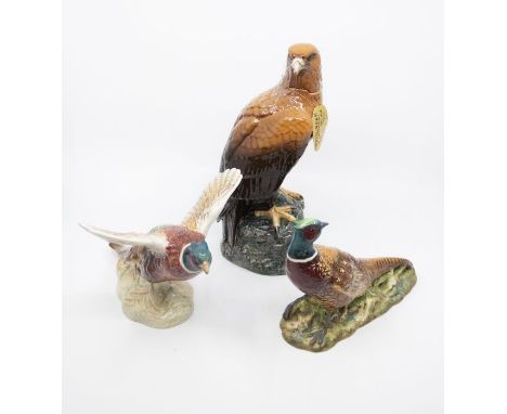 Beswick golden eagle decanter containing whisky and two Beswick pheasants, 849 and 1226. No signs of damage to any piece.