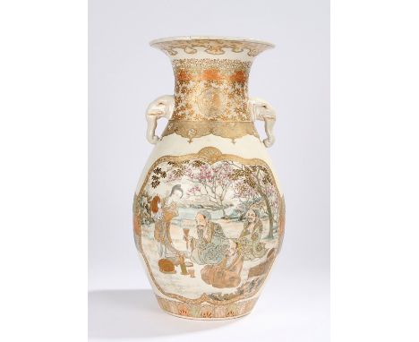 Japanese Satsuma ware porcelain vase, with elephant mask handles decorated with scrolls and figural scenes showing a group of