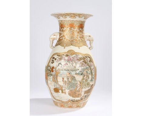 Japanese Satsuma ware porcelain vase, with elephant mask handles decorated with scrolls and figural scenes showing a group of