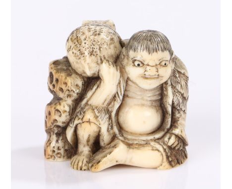 Japanese Meiji period netsuke, the netsuke carved as Gama Senni seated by a rocky outcrop and with a toad on his shoulder, 4c