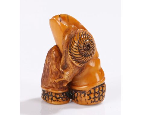 Japanese Meiji period ivory netsuke, of a snail crawling on bamboo, 4.2cm high