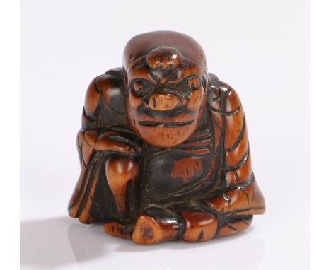 Japanese Edo period carved netsuke, as a figure with a large nose, 4cm high