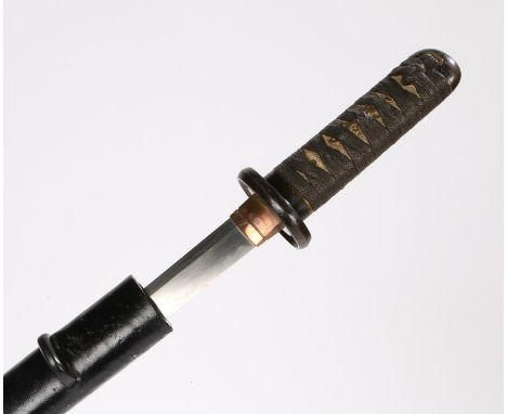 Japanese Edo period wakizashi, the hilt with plain copper fuchi-kashira, fishskin binding to the grip, plain copper oval tsub