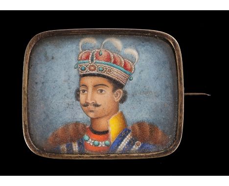 Mid 19th Century Indian miniature head and shoulder portrait of a regal gentleman wearing a feathered gilt crown, with elabor