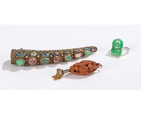 Chinese jewellery, to include a jade set white metal banded ring, a carved bead in the form of a leaf and a silver nail prote