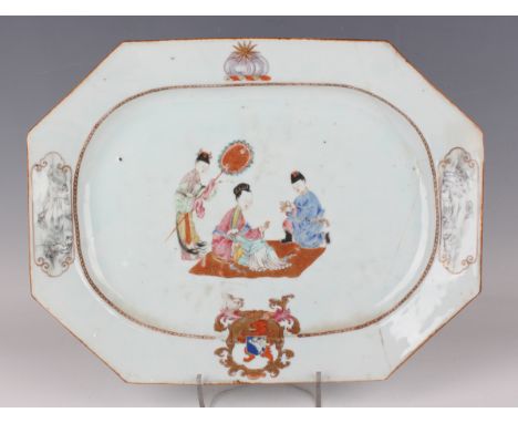 A Chinese famille rose armorial export porcelain meat dish, Qianlong period, painted and gilt with a central figural scene ab