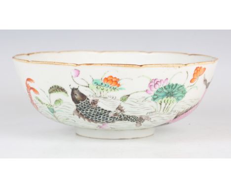 A Chinese famille rose porcelain circular bowl, mark of Jiaqing but probably 20th century, the exterior painted with fish in 