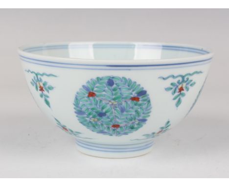 A Chinese doucai porcelain bowl, mark of Chenghua but Qing dynasty, of steep-sided circular form, the exterior with four foli