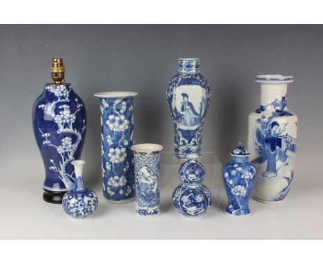 A collection of Chinese blue and white porcelain, late 19th century and later, including a cylinder vase, mark of Kangxi but 