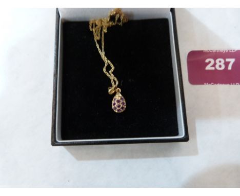 A 9ct amethyst set pendant on 9ct necklet chain. 1.6g gross