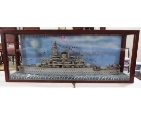 A cased scratch-built model of a battleship. 21' x 53'
