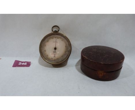 A leather cased gilt brass travelling barometer by Baker, High Holborn , London