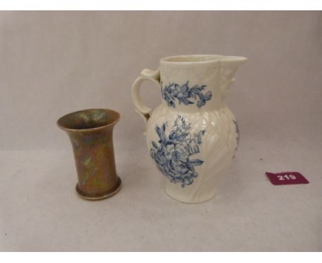 A Royal Worcester blue and white jug. 5' high and a Ruskin high fired vase. 3' high
