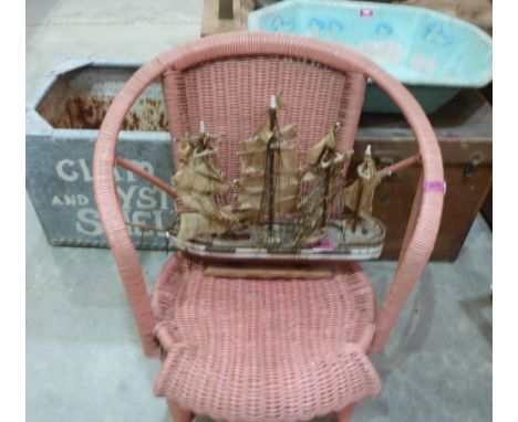 A 1920s tin infant's bath, a Travel Trunk, a loom armchair, a model of a ship and a painted zinc tank