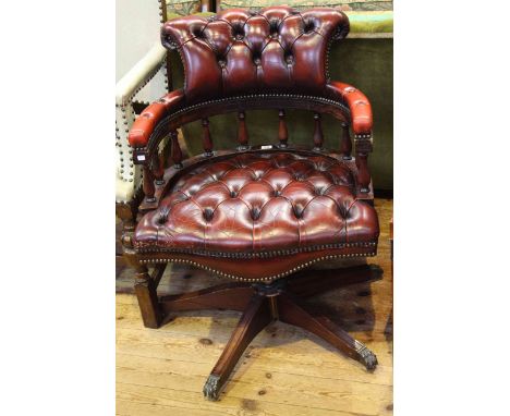Ox blood deep buttoned leather captains style swivel desk chair