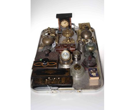 Two brass and other inkwells, assorted table bells, two papier mache pen boxes, two blotters, marble and desk clocks, etc