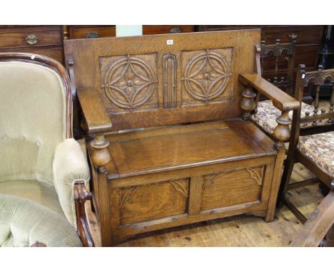 Carved oak monks bench