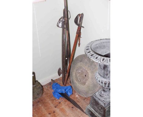 Collection of various weapons including three swords, axe, spear heads and spear