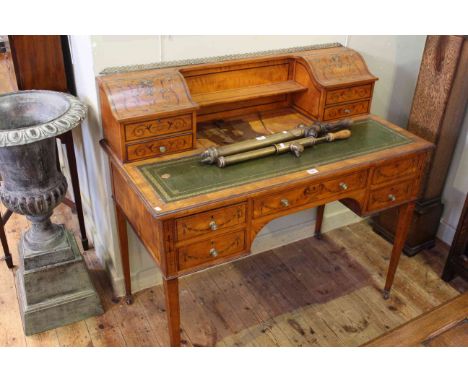 Victorian inlaid satinwood Carlton House style desk having upper stationery compartments and two drawers above a writing surf