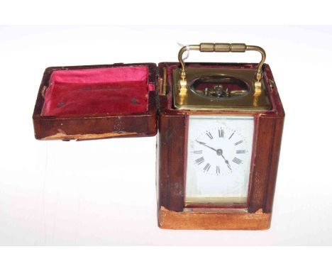 Late 19th Century brass cased striking carriage clock in travelling case