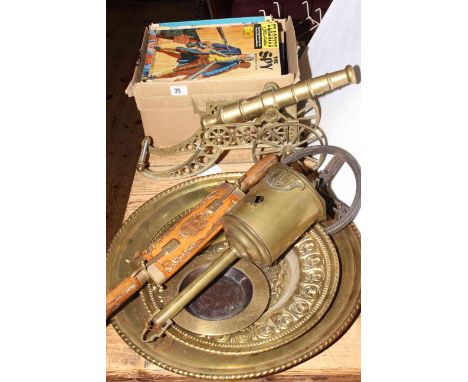 Box of comics, brass desk canon, plaques, spit jack and meat knife and fork