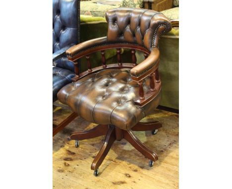 Brown deep buttoned leather captains style swivel desk chair