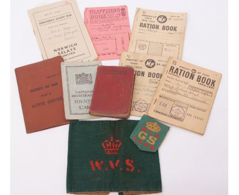 Quantity of WWII Home Front ephemera to include ration books, identity cards, soldier's pay book, clothing ration coupons boo