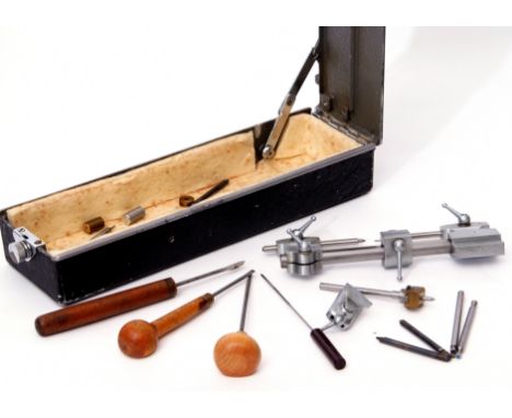 Two boxes various tools and watchmaker's spares including Steiner turns and gravers, watch screws, set bridges, wire click sp