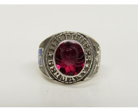 A post-war white metal gent's signet ring set with crab engraved red stone, "US FORCES GERMANY", stamped silver 