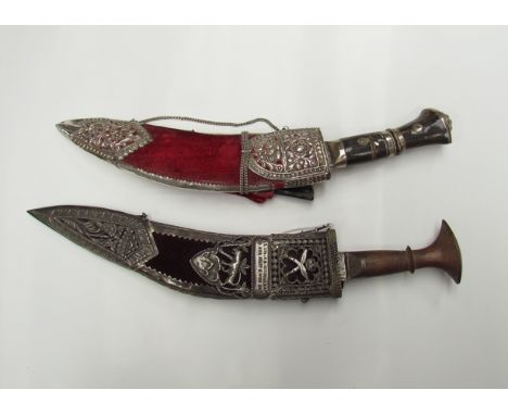 A mid 20th Century kukri with white metal design of Gurkha emblem, inscribed "Lt Col. RAMC by GOR Staff H/Wing July 65