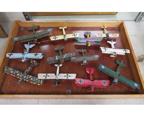 A set of twelve model aircraft, mainly biplanes
