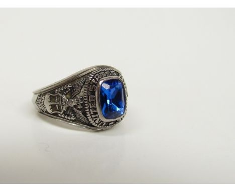 A post-war white metal gent's signet ring set with blue stone, "United States Air Force" 