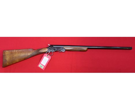 A folding single barrel 12 bore hammer shotgun with 24" barrel, action marked 'Made in England' with barrel marked Cogswell &